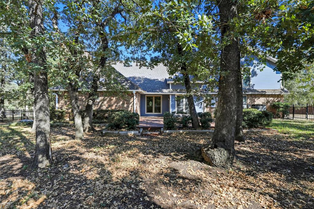 6140 Dick Price Road Fort Worth, TX 76140 - Photo 32 of 40 a view of a house with yard and tree s