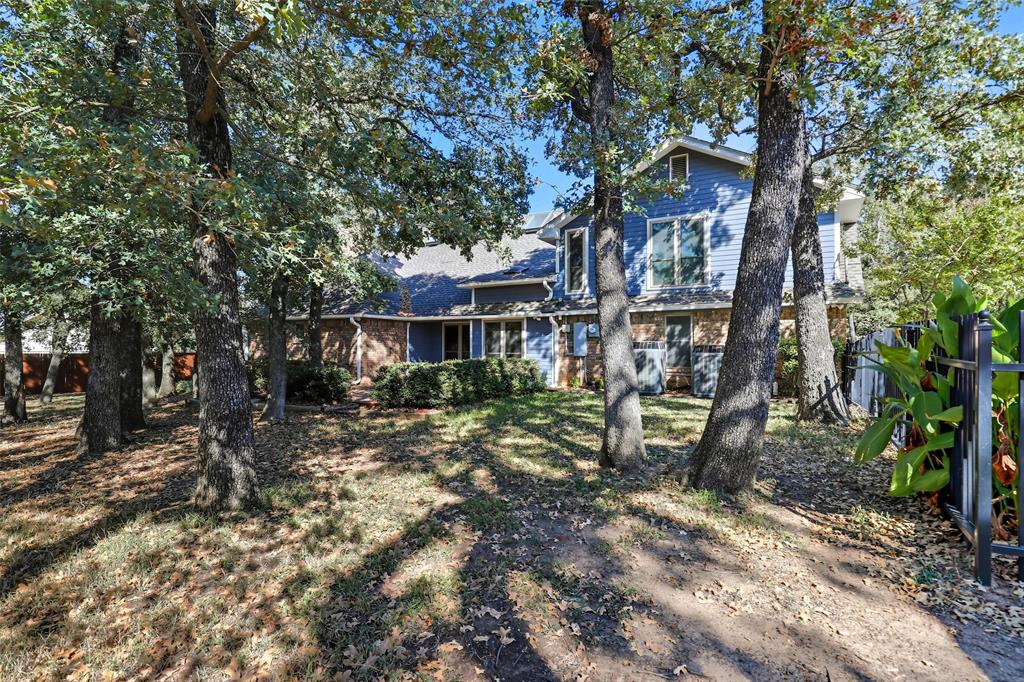 6140 Dick Price Road Fort Worth, TX 76140 - Photo 33 of 40 a front view of a house with garden