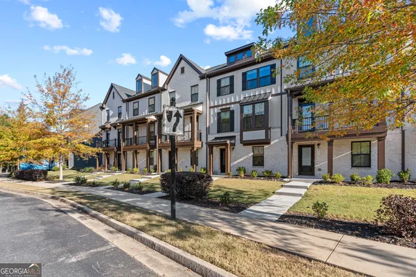 a view of a building with a street