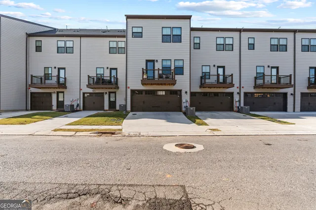 a view of a living room and bathroom