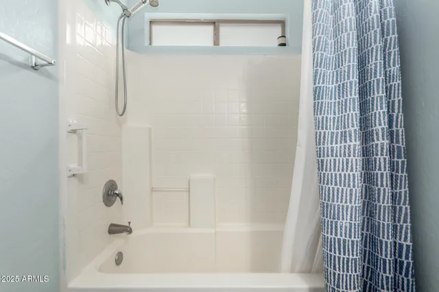 a bathroom with a bathtub