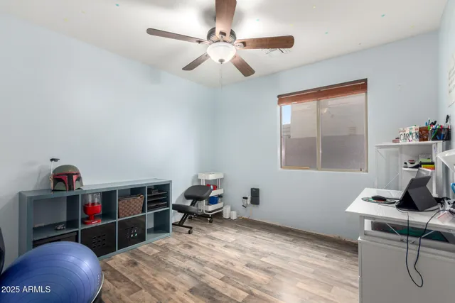 a workspace with furniture and window