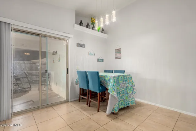 a room that has a mirror and a chair in it