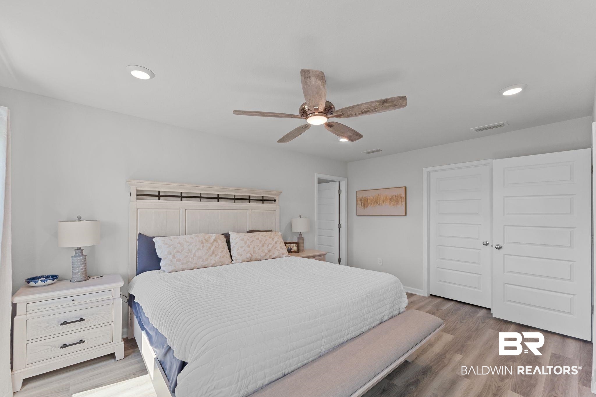 24337 Ringneck Loop Elberta, AL 36530 - Photo 15 of 34 Bedroom featuring recessed lighting, light wood-style flooring, and a ceiling fan