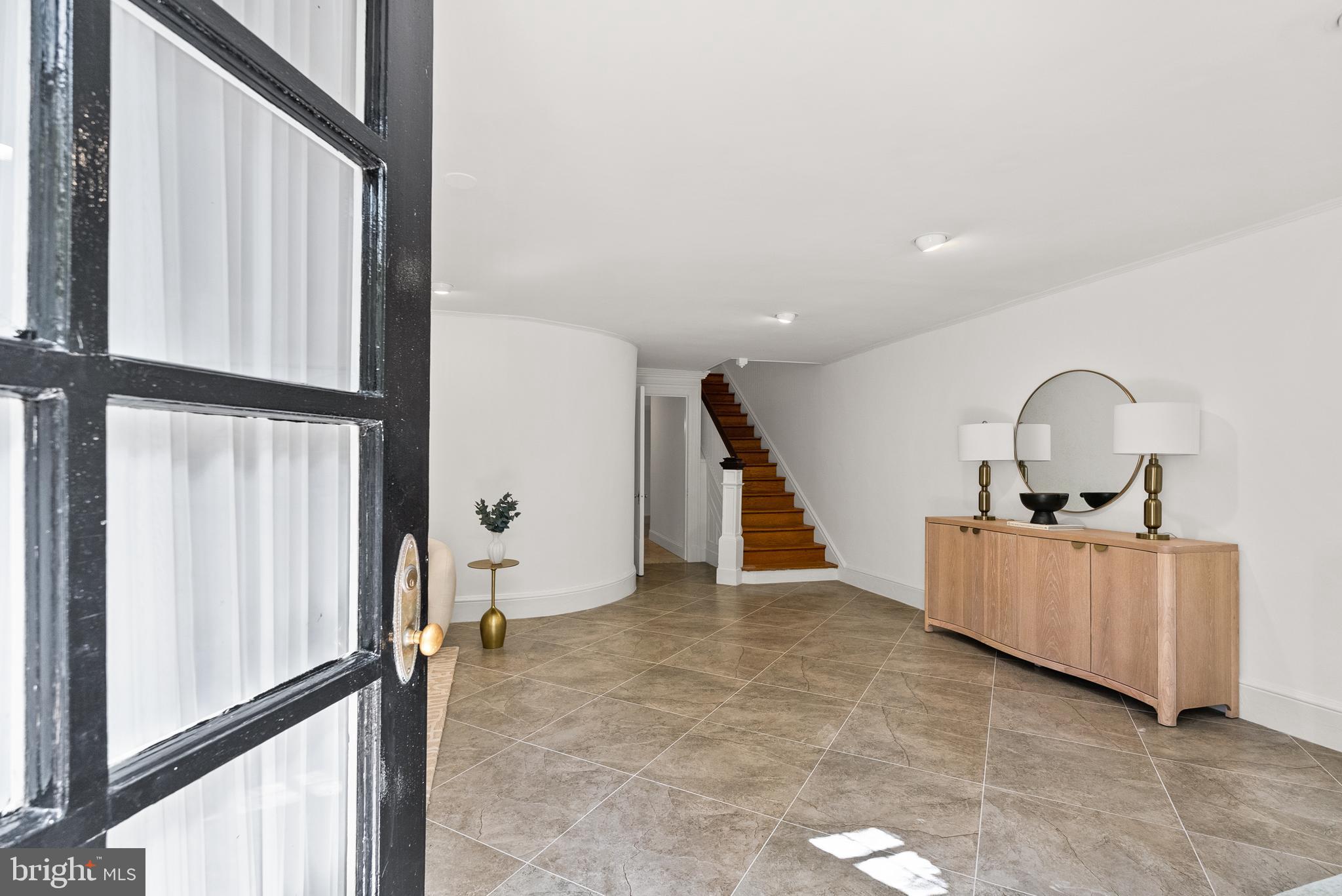 2125 Bancroft Place Northwest Washington, DC 20008 - Photo 2 of 48 a view of living room with furniture and a window