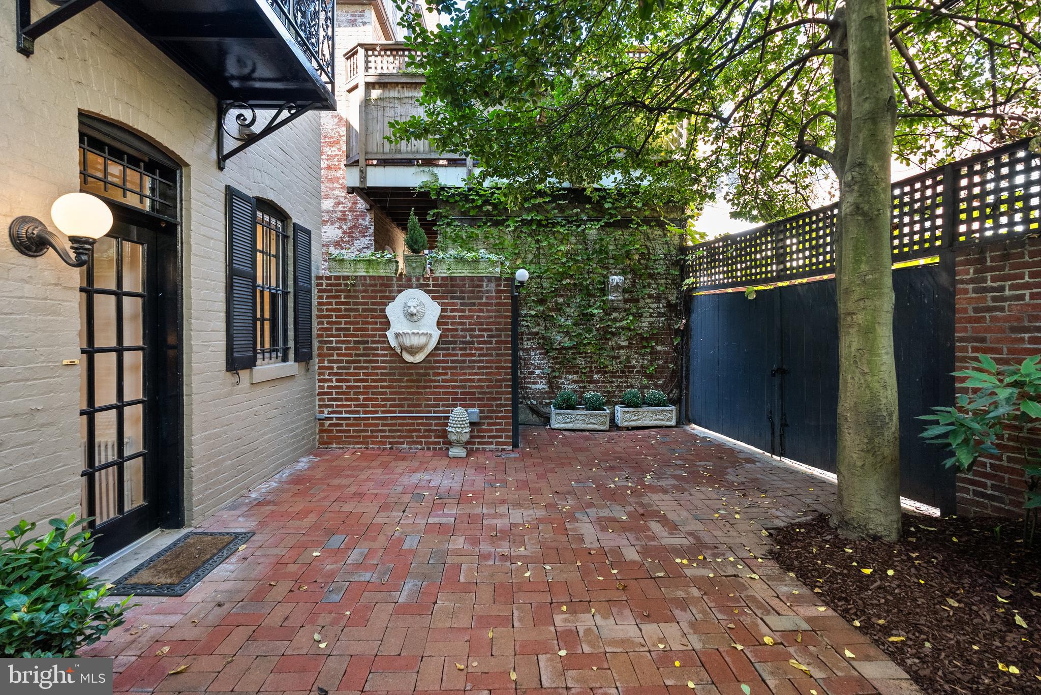 2125 Bancroft Place Northwest Washington, DC 20008 - Photo 21 of 48 a view of a house with brick walls
