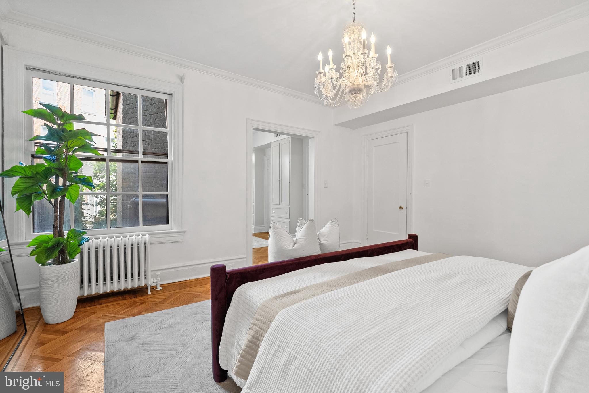 2125 Bancroft Place Northwest Washington, DC 20008 - Photo 25 of 48 a bedroom with bed and a window