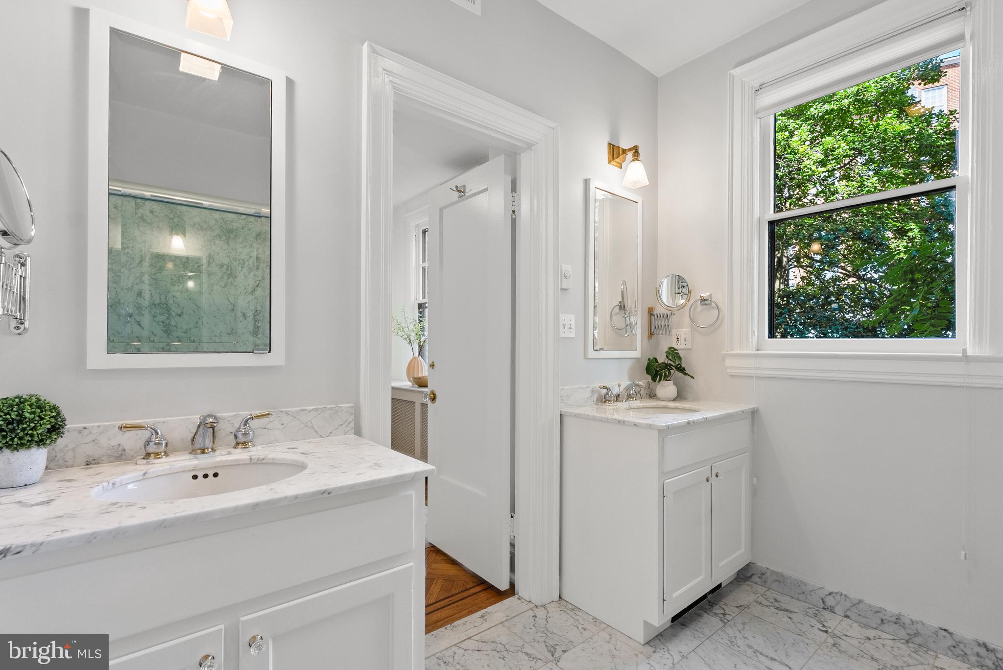 2125 Bancroft Place Northwest Washington, DC 20008 - Photo 30 of 48 a bathroom with a sink and a mirror