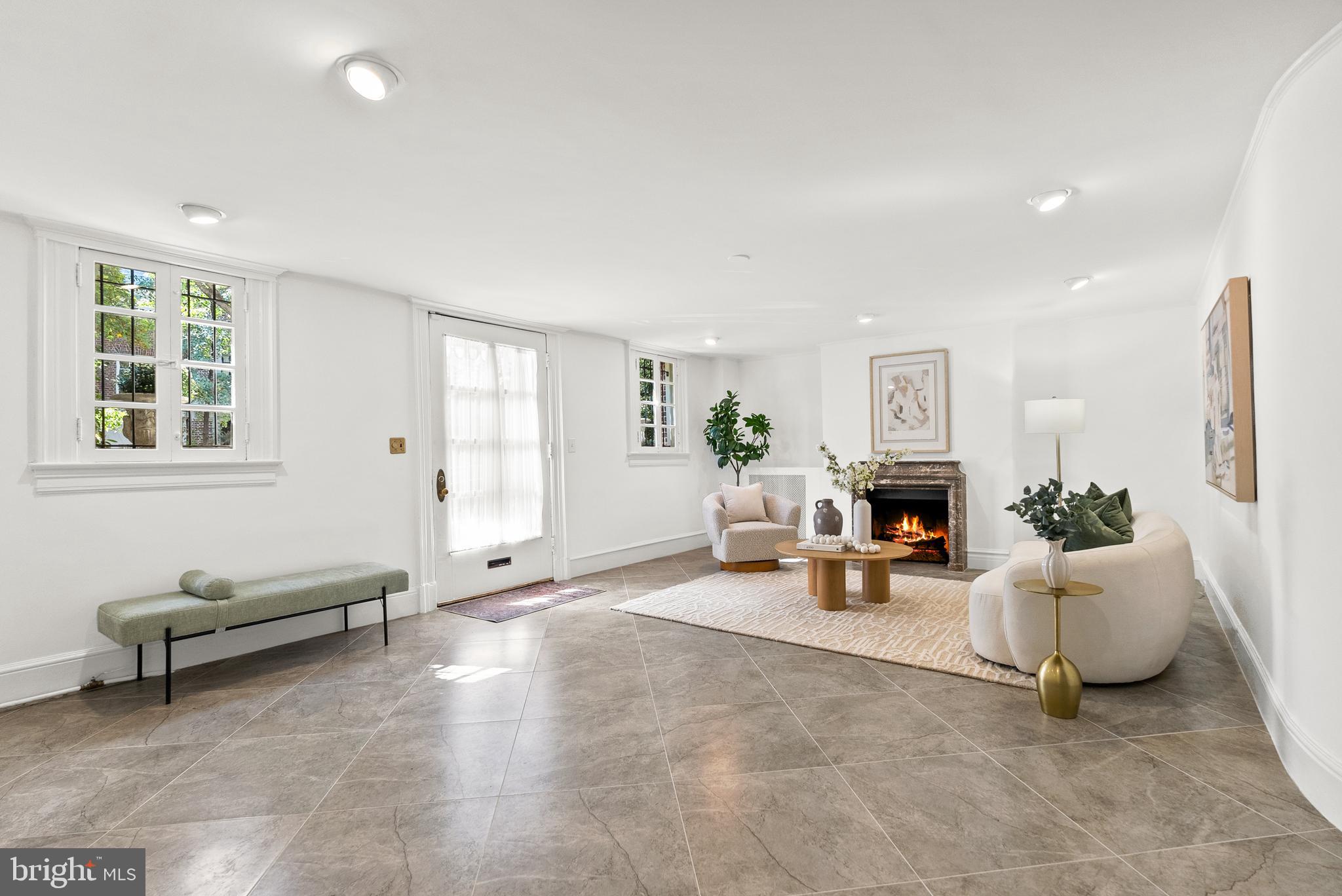 2125 Bancroft Place Northwest Washington, DC 20008 - Photo 4 of 48 a living room with furniture and a fireplace