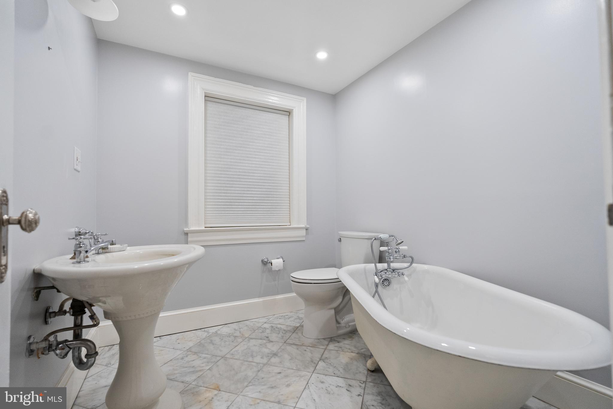 2125 Bancroft Place Northwest Washington, DC 20008 - Photo 44 of 48 a bathroom with a sink and mirror