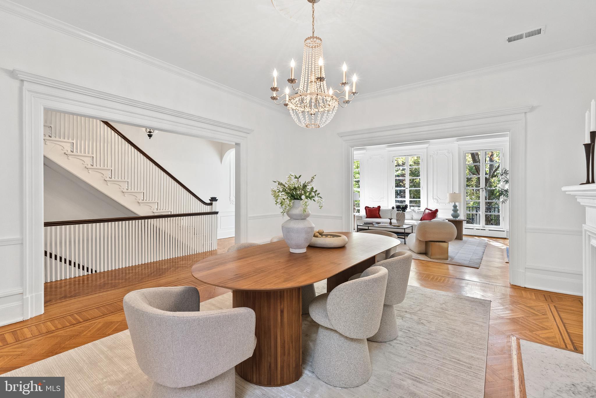 2125 Bancroft Place Northwest Washington, DC 20008 - Photo 8 of 48 a dining room with furniture a chandelier and wooden floor