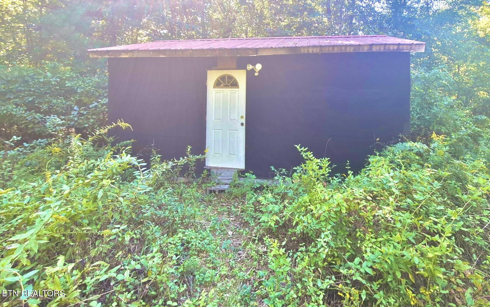 194 Williams Branch Road Lancing, TN 37770 - Photo 11 of 12 Storage shed