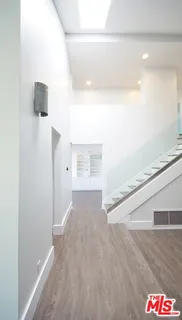 a view of hallway with stairs