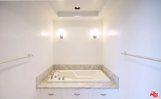 a bathroom with a bathtub