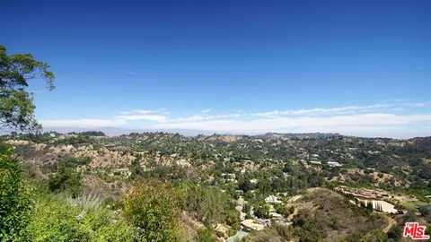 a view of city and mountain