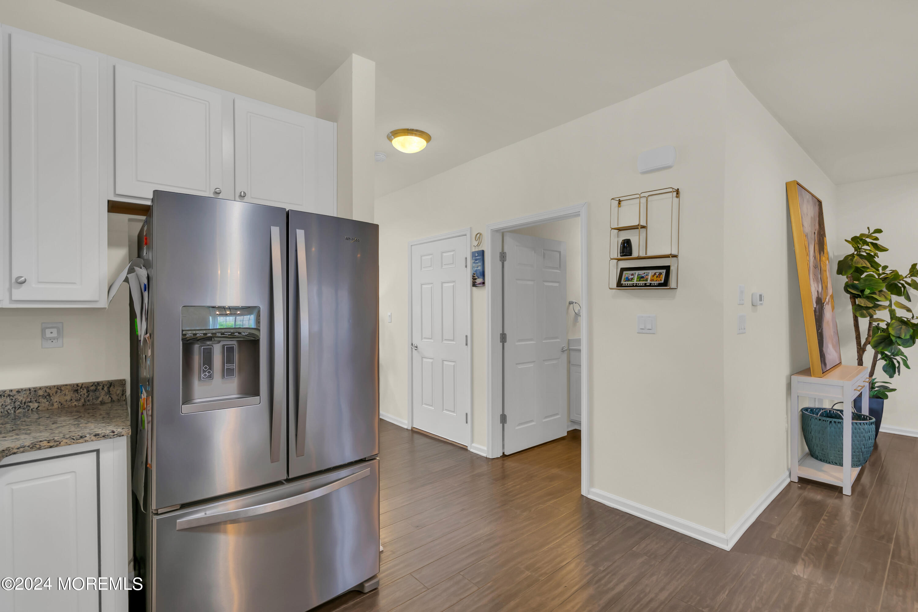 20 Rockingham Way Manchester Township, NJ 08759 - Photo 11 of 40 a metallic refrigerator freezer sitting in a kitchen