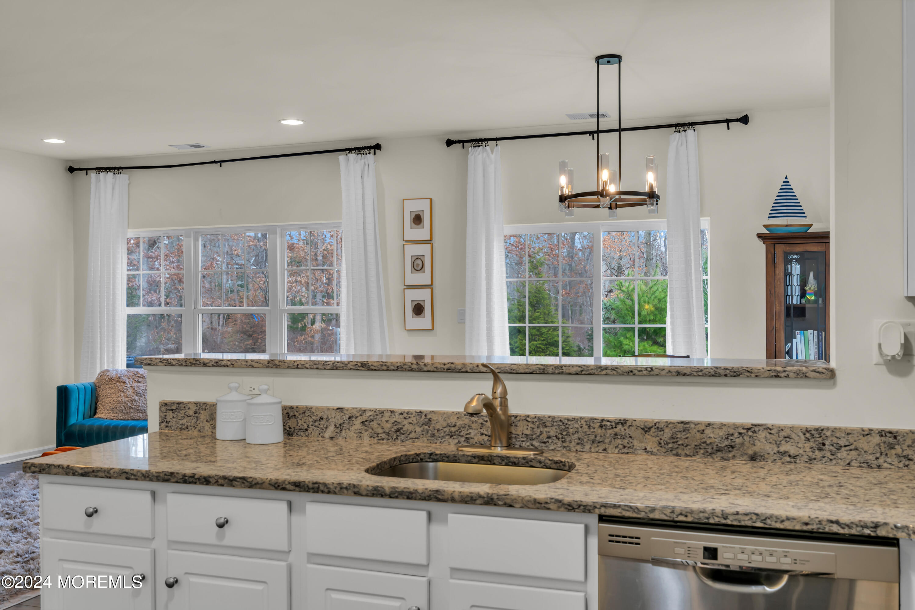 20 Rockingham Way Manchester Township, NJ 08759 - Photo 16 of 40 a kitchen with granite countertop stainless steel appliances a sink a stove and a counter space