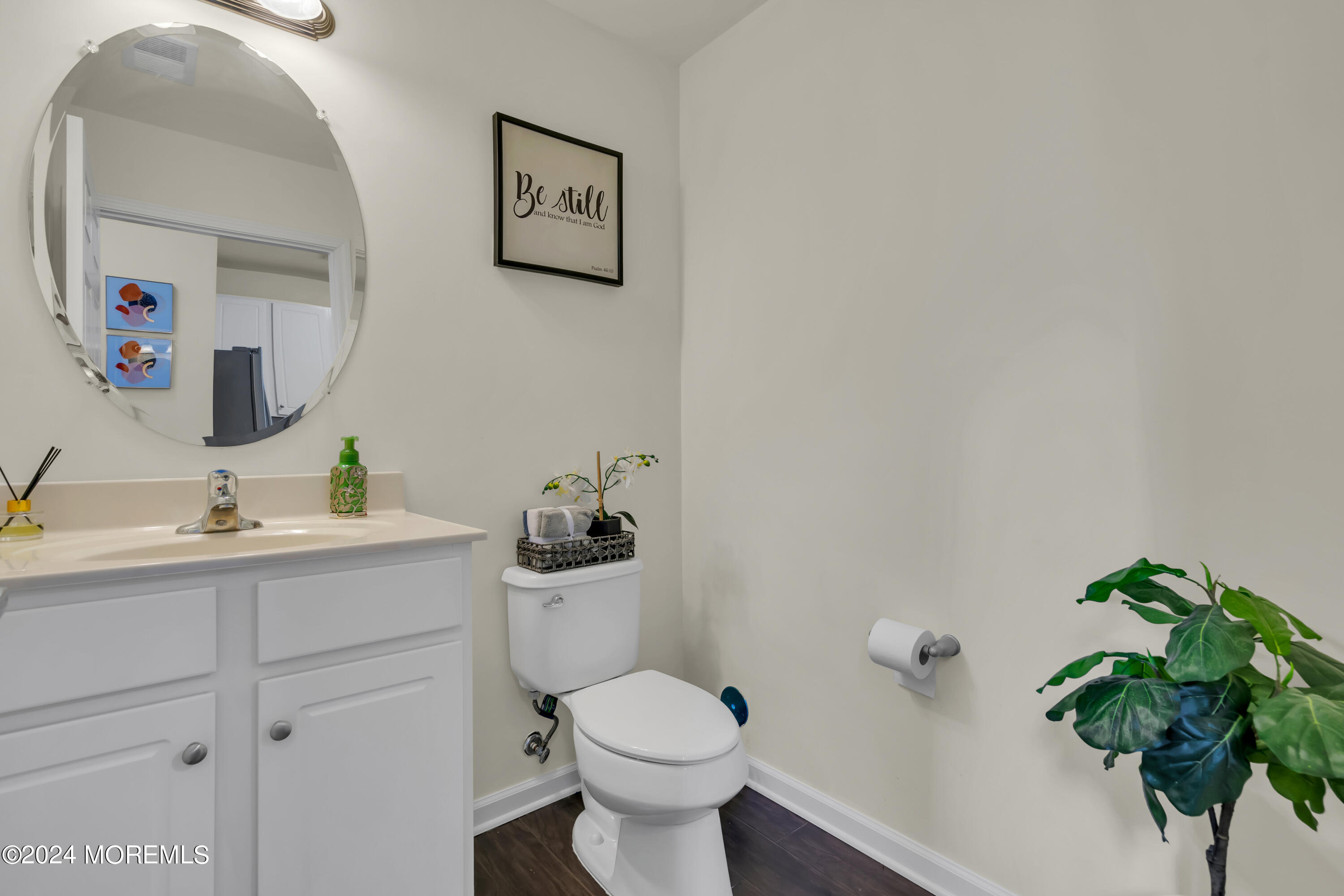 20 Rockingham Way Manchester Township, NJ 08759 - Photo 23 of 40 a bathroom with a toilet sink and mirror