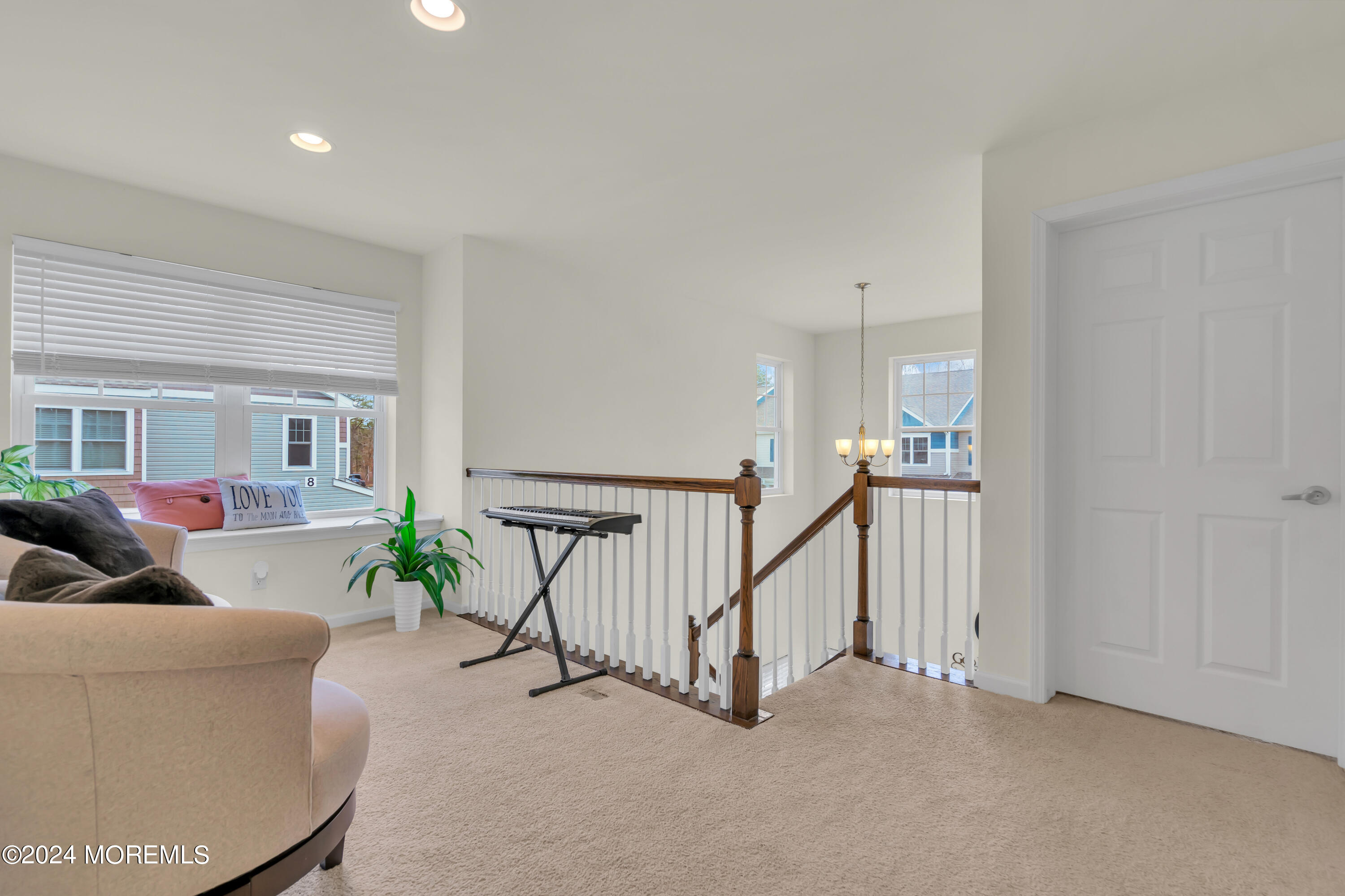 20 Rockingham Way Manchester Township, NJ 08759 - Photo 26 of 40 a living room with furniture and a flat screen tv