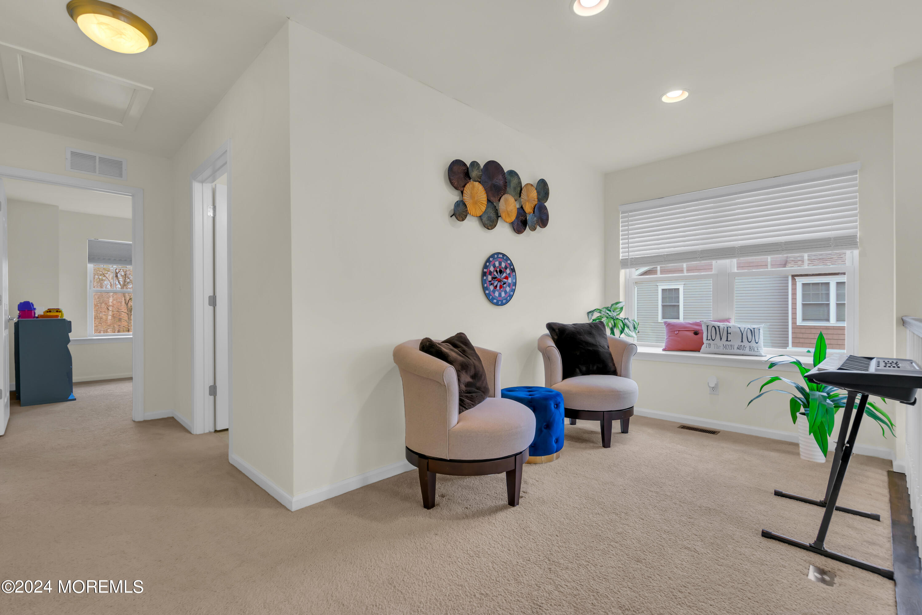 20 Rockingham Way Manchester Township, NJ 08759 - Photo 27 of 40 a living room with furniture and a work place