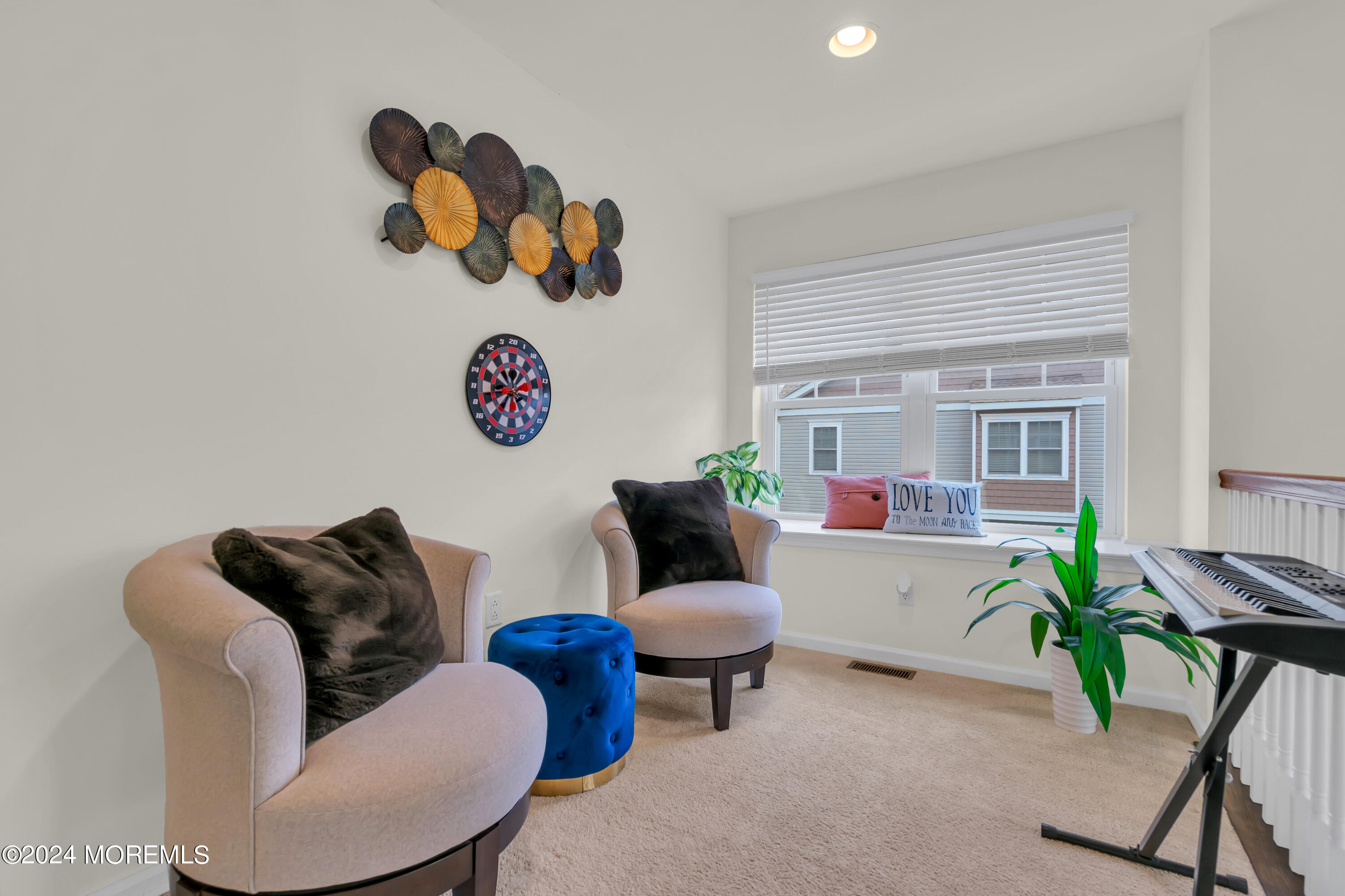 20 Rockingham Way Manchester Township, NJ 08759 - Photo 28 of 40 a living room with furniture and a potted plant