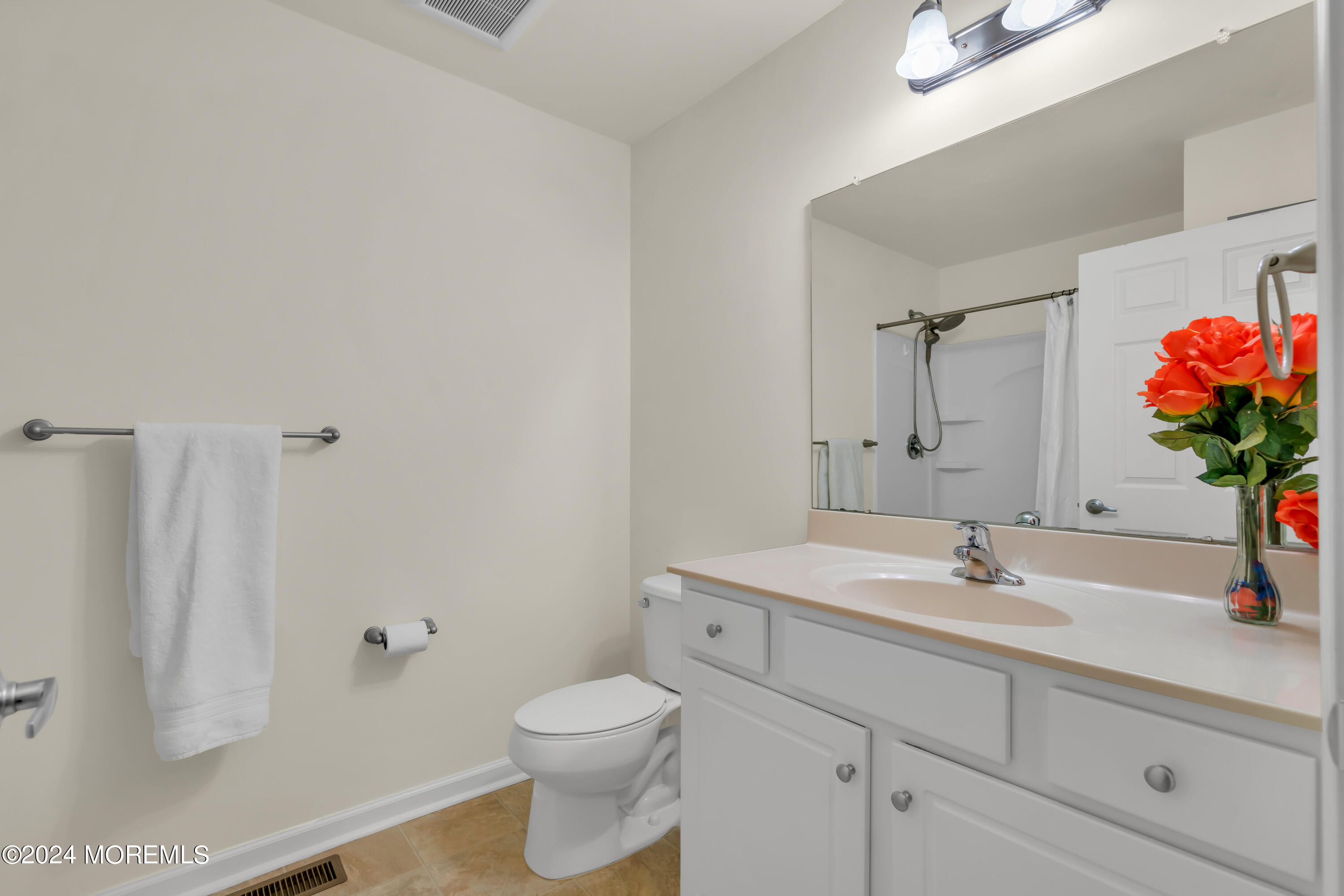 20 Rockingham Way Manchester Township, NJ 08759 - Photo 32 of 40 a bathroom with a sink toilet and shower