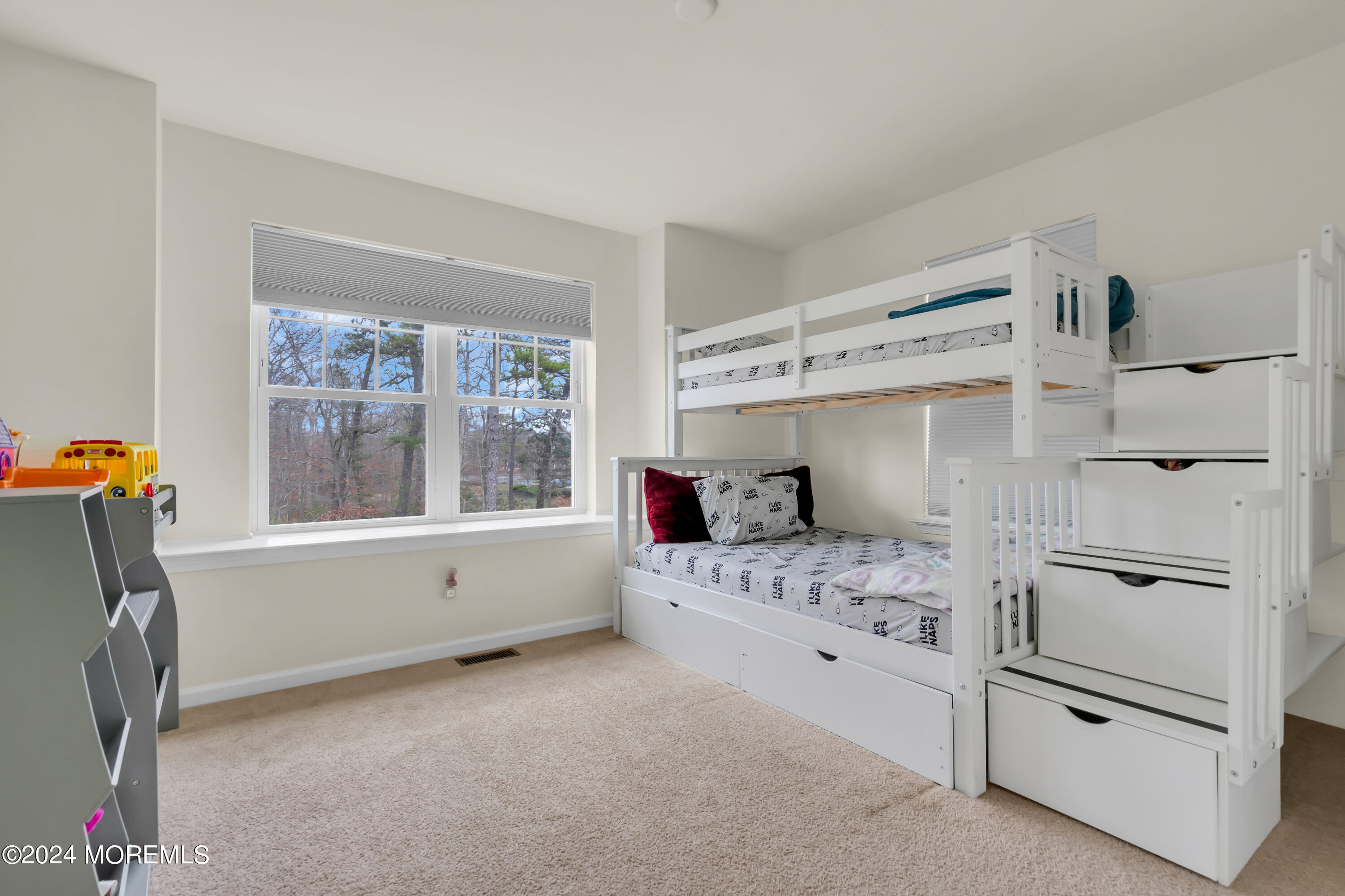 20 Rockingham Way Manchester Township, NJ 08759 - Photo 33 of 40 a room with a bed and a window