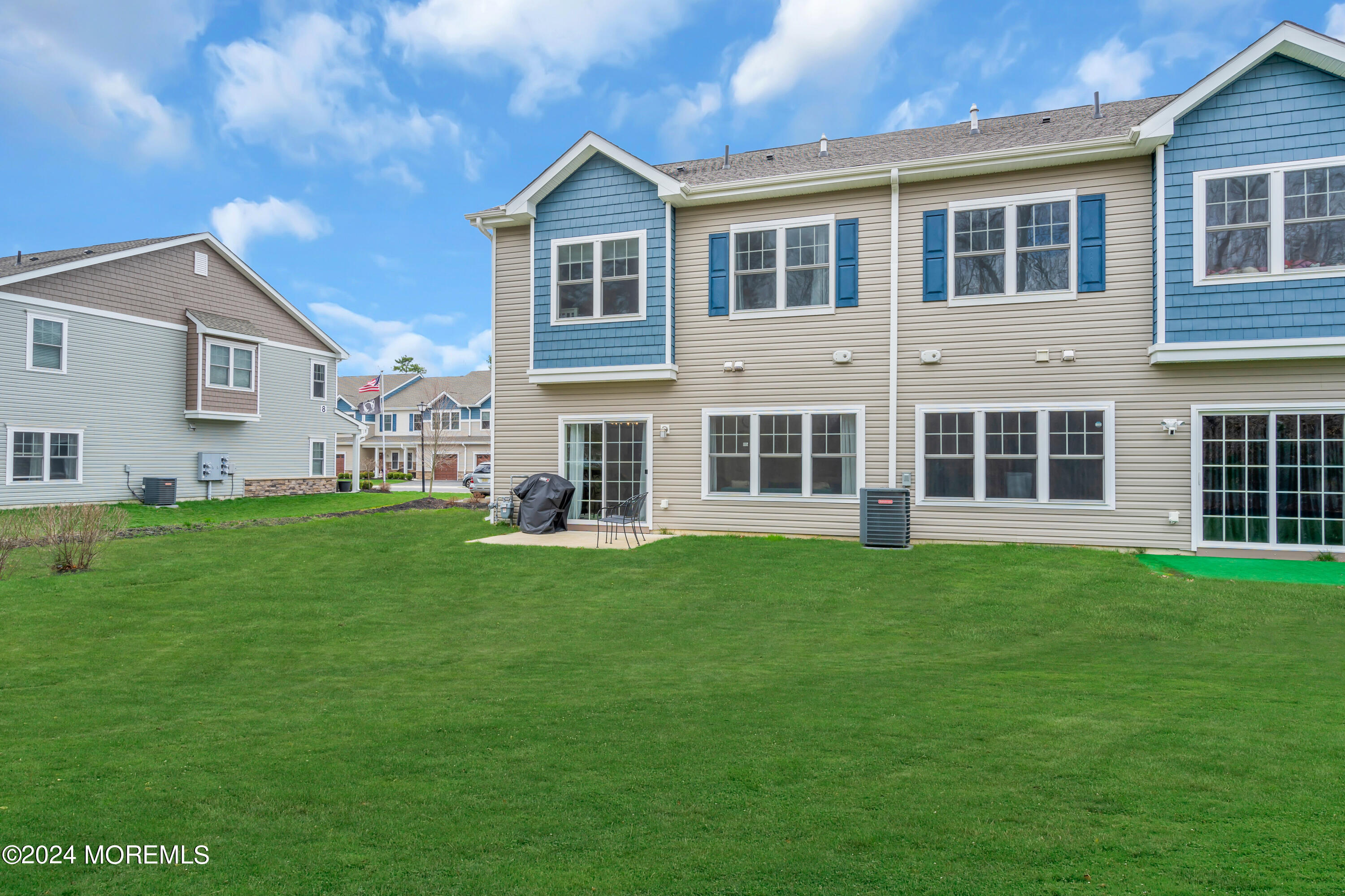 20 Rockingham Way Manchester Township, NJ 08759 - Photo 38 of 40 a front view of a house with a yard