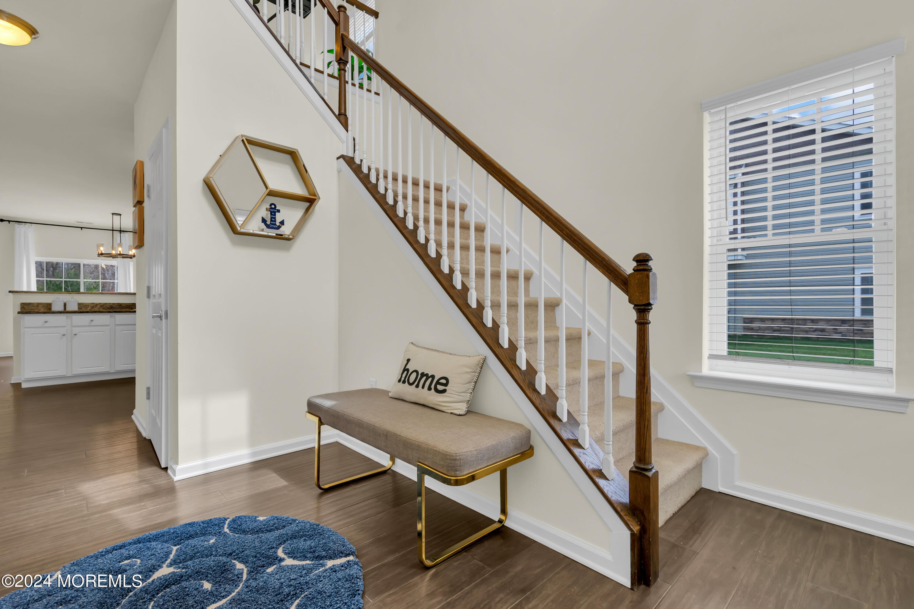 20 Rockingham Way Manchester Township, NJ 08759 - Photo 9 of 40 a view of entryway and hall with wooden floor