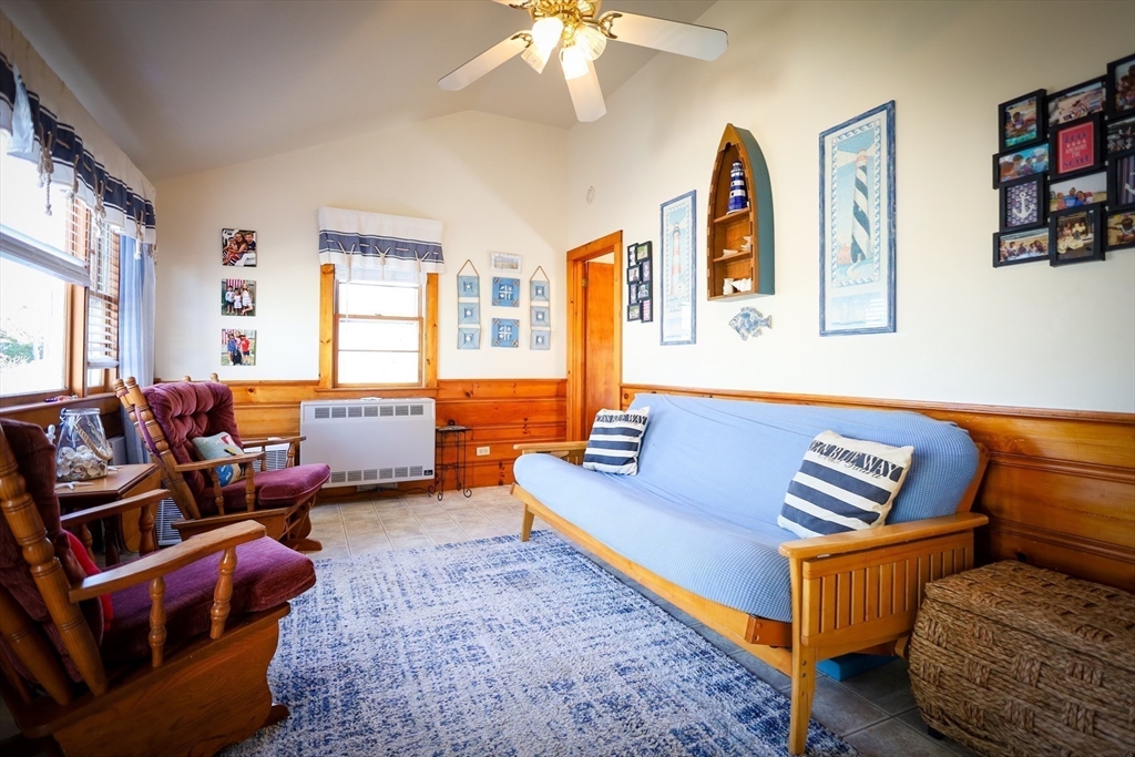 253 Shad Hole Road, Unit 3A Dennis, MA 02639 - Photo 2 of 25 a living room with furniture and a window