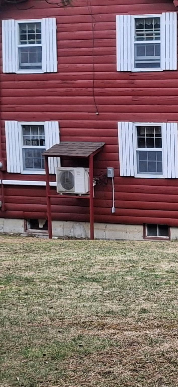 382 Wrightville Road Ashland, ME 04732 - Photo 38 of 46 Heat pump w cover