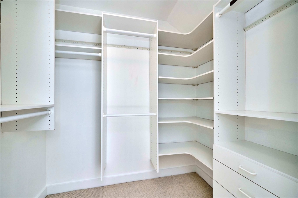 626 Washington Street, Unit 4 Brookline, MA 02446 - Photo 18 of 37 a view of an empty walk in closet