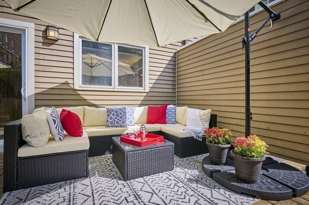 626 Washington Street, Unit 4 Brookline, MA 02446 - Photo 10 of 37 a building outdoor space with furniture
