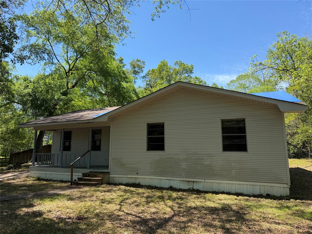 336 Butler Street Rusk, TX 75785 - Photo 7 of 27 a backyard of a house