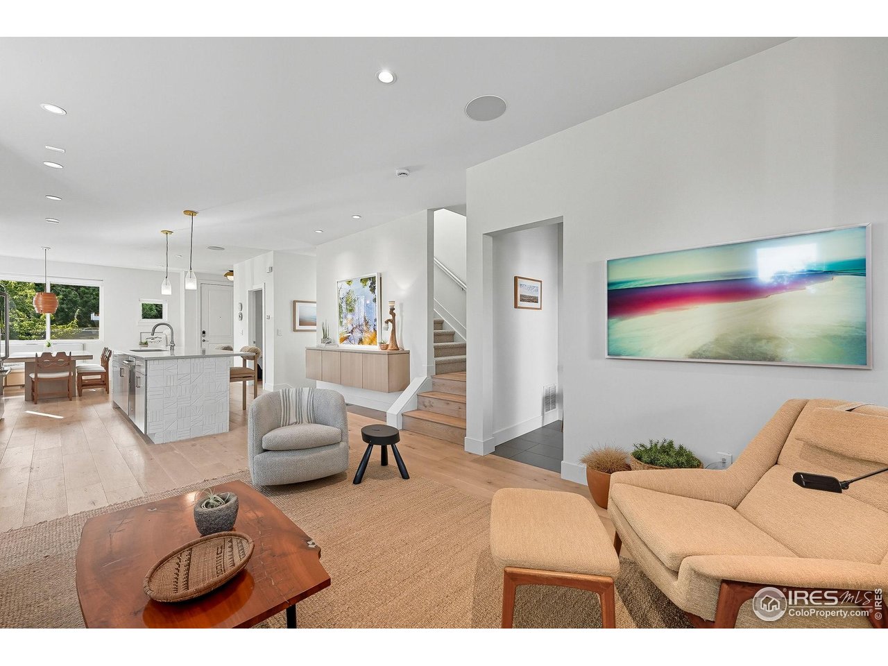 4740 8th Street Boulder, CO 80304 - Photo 15 of 50 a living room with furniture and a flat screen tv