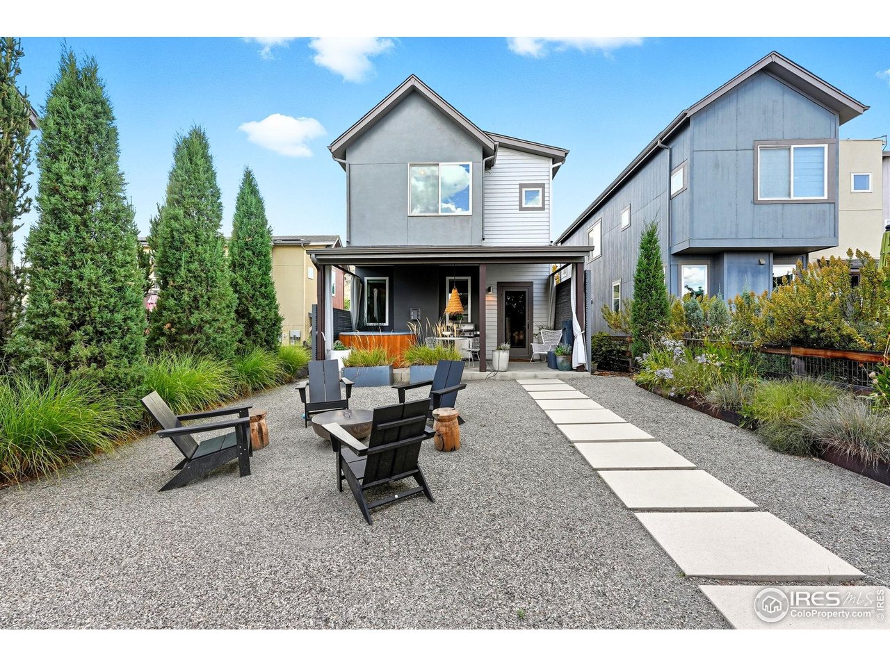 4740 8th Street Boulder, CO 80304 - Photo 43 of 50 a backyard of a house with outdoor seating