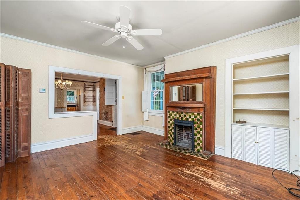 4104 Ben Miller Road Gibsonia, PA 15044 - Photo 11 of 38 a view of an empty room with a window and wooden floor