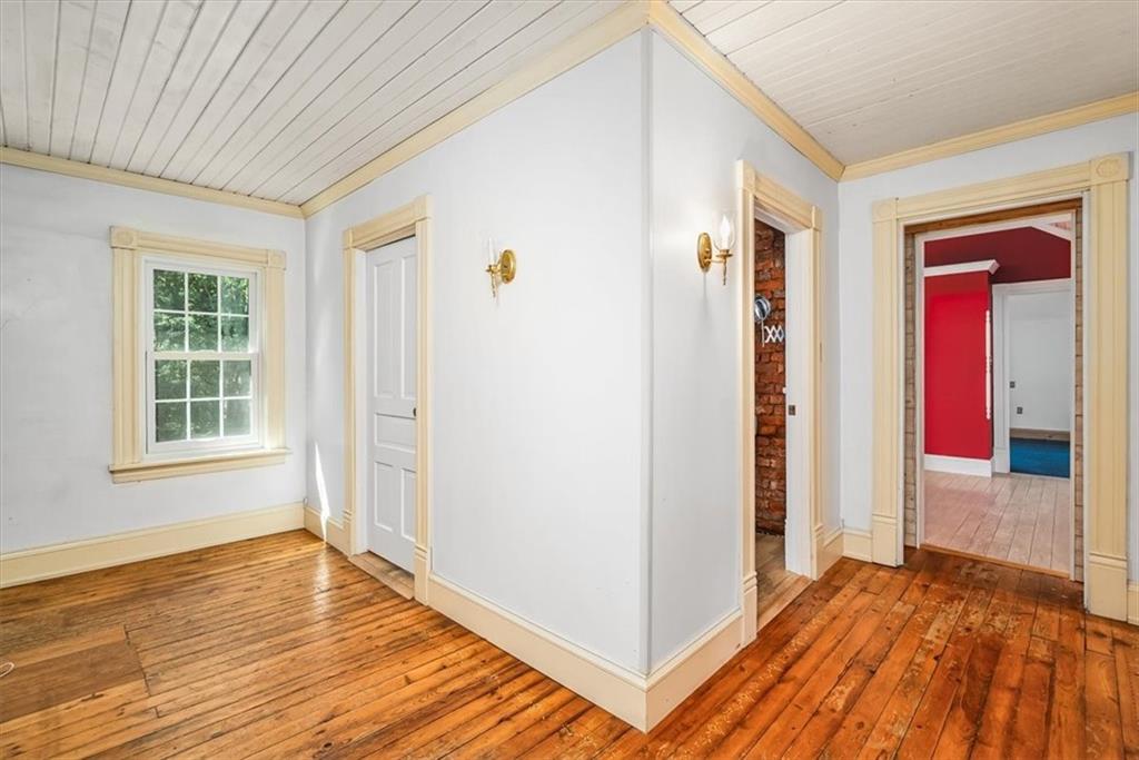 4104 Ben Miller Road Gibsonia, PA 15044 - Photo 18 of 38 a view of a livingroom with wooden floor and window