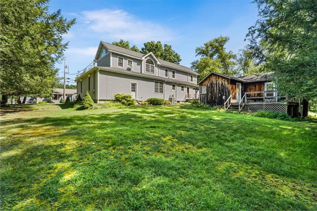 4104 Ben Miller Road Gibsonia, PA 15044 - Photo 35 of 38 a big house with a big yard and large trees