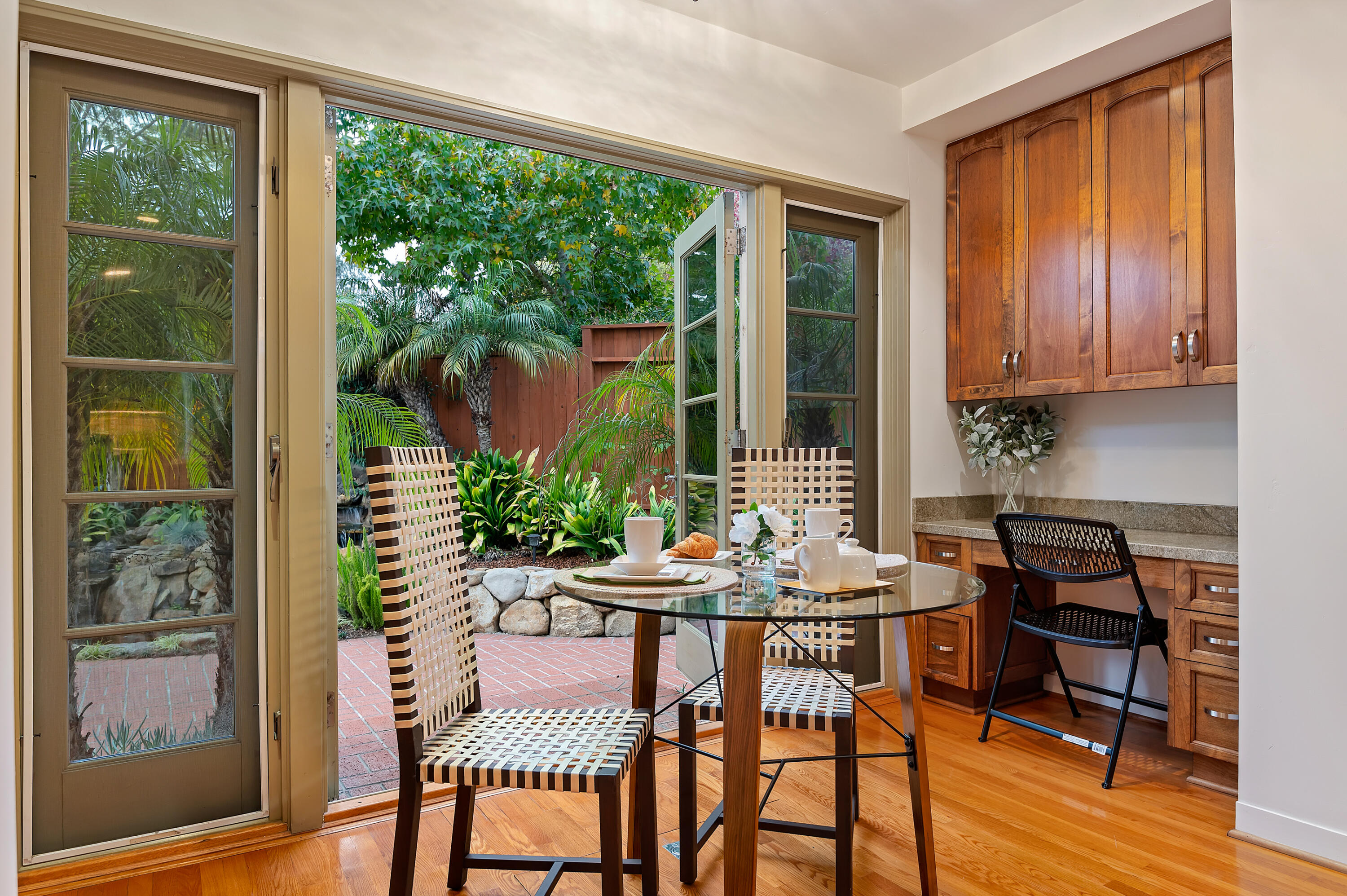 189 Hermosillo Road Montecito, CA 93108 - Photo 14 of 47 a view of a dining room with furniture window and outside view