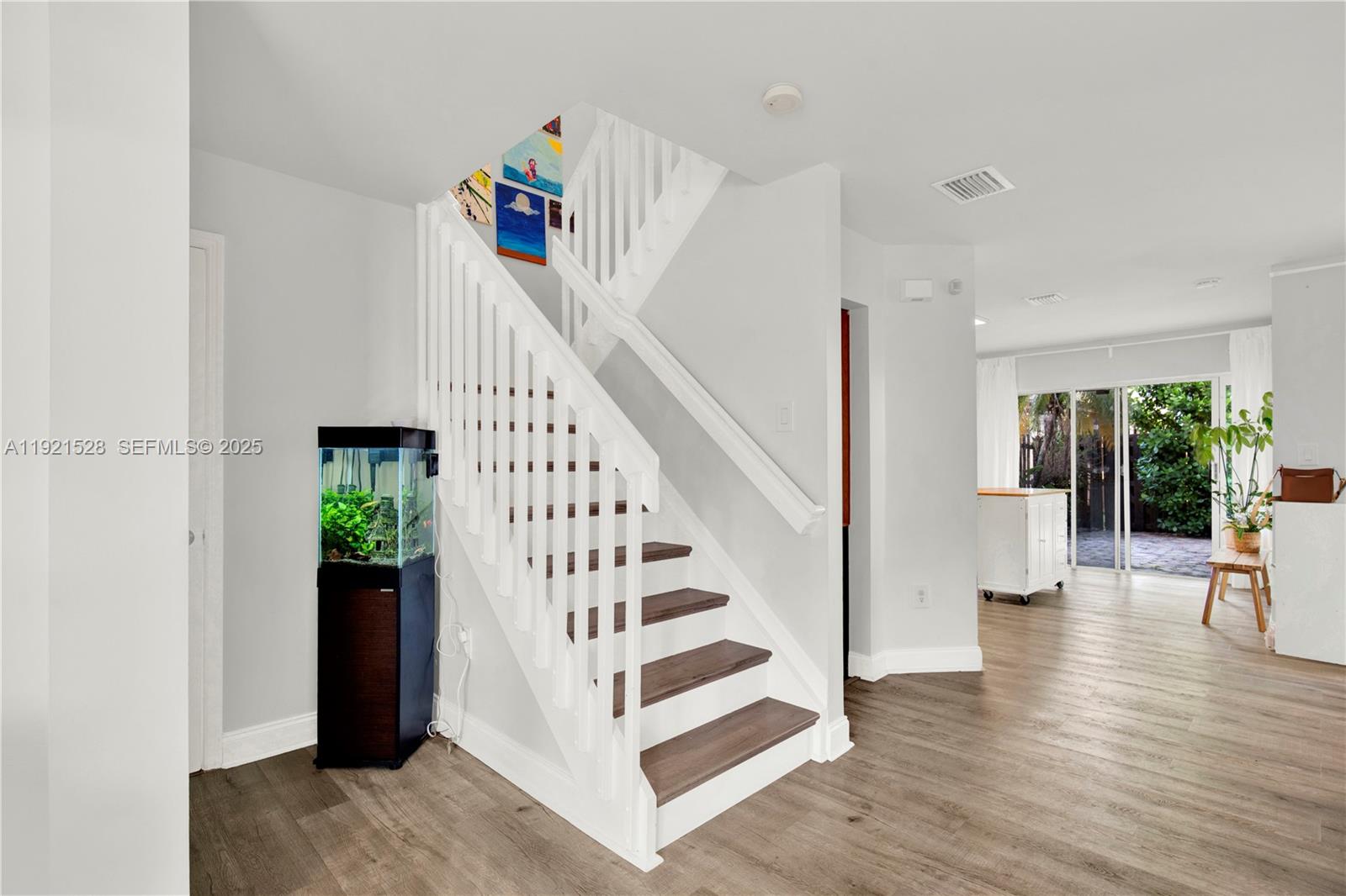 16415 Southwest 73rd Terrace Miami, FL 33193 - Photo 11 of 41 a view of entryway and hall with wooden floor