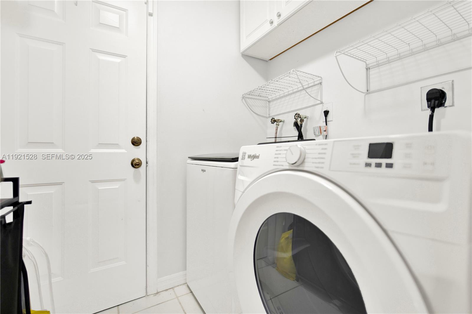 16415 Southwest 73rd Terrace Miami, FL 33193 - Photo 16 of 41 a utility room with dryer and washer