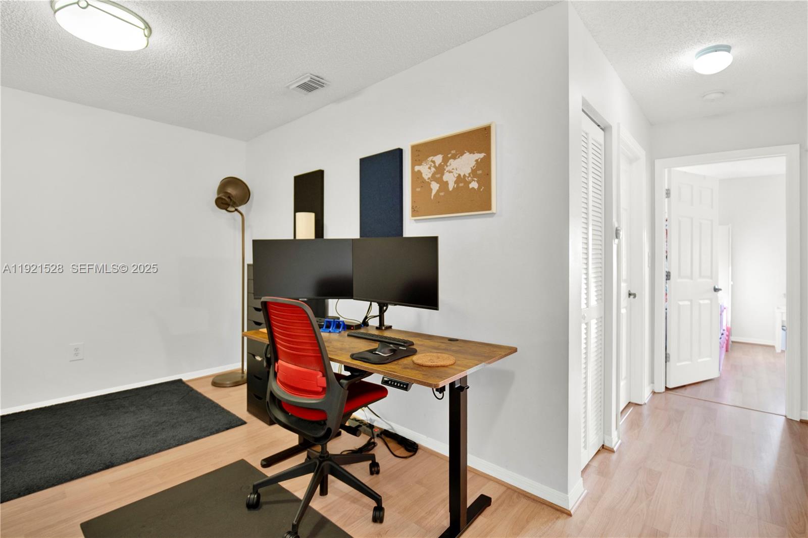 16415 Southwest 73rd Terrace Miami, FL 33193 - Photo 21 of 41 a workspace with furniture and wooden floor