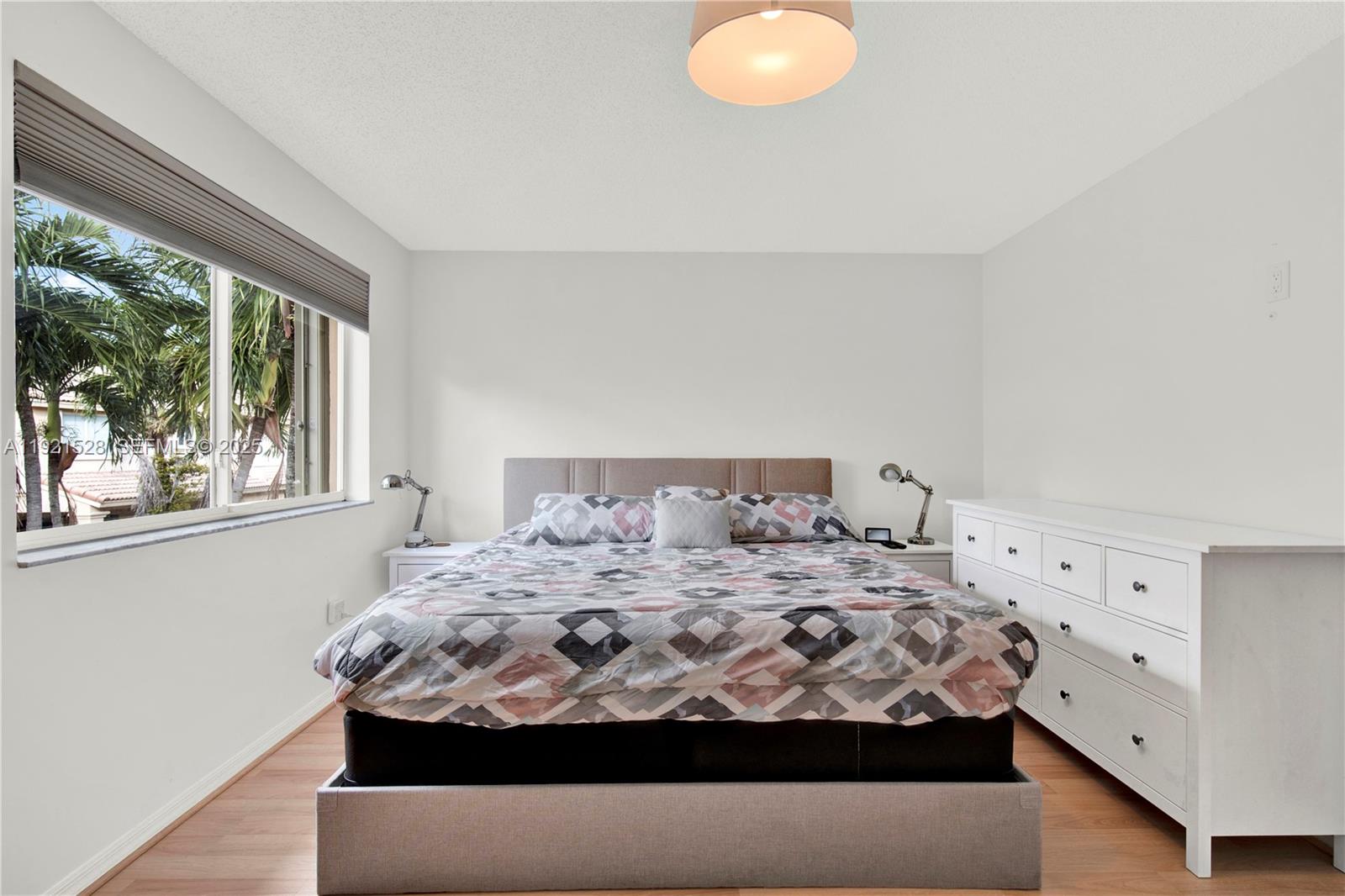 16415 Southwest 73rd Terrace Miami, FL 33193 - Photo 27 of 41 a room with a bed and window