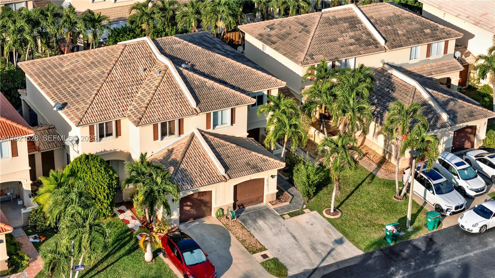 16415 Southwest 73rd Terrace Miami, FL 33193 - Photo 37 of 41 a view of a house with a yard and potted plants