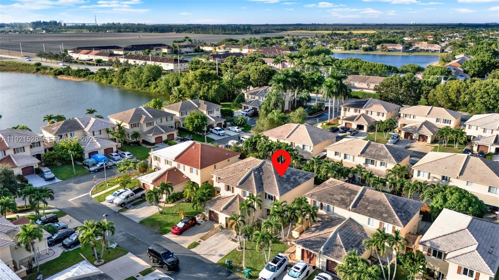 16415 Southwest 73rd Terrace Miami, FL 33193 - Photo 38 of 41 an aerial view of a houses with a lake view