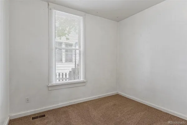 an empty room with a window