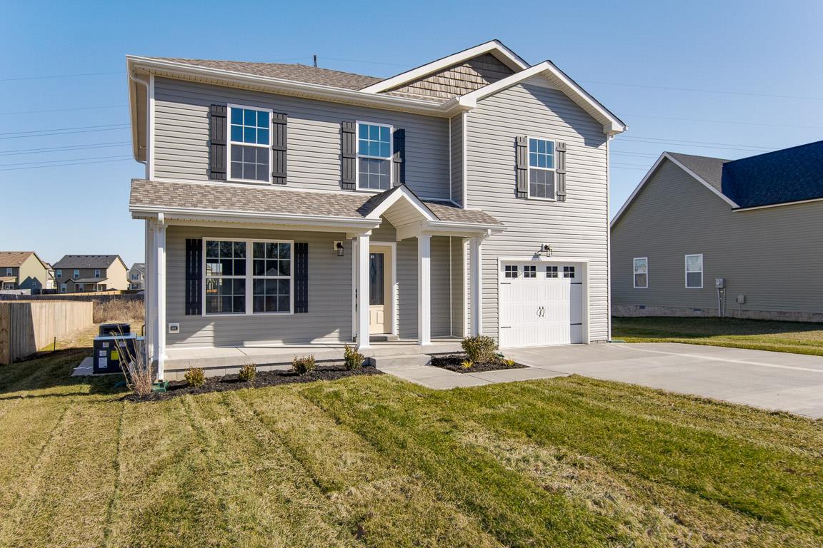 2316 Pea Ridge Road Clarksville, TN 37040 - Photo 2 of 30 a front view of a house with a yard