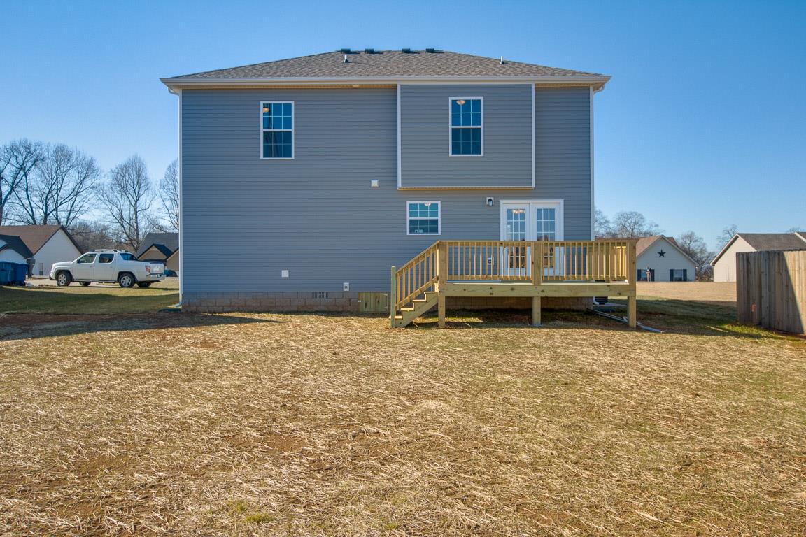 2316 Pea Ridge Road Clarksville, TN 37040 - Photo 3 of 30 a backyard of a house with barbeque oven