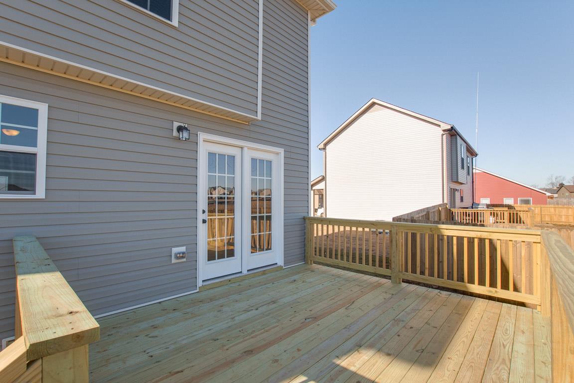 2316 Pea Ridge Road Clarksville, TN 37040 - Photo 4 of 30 a view of a deck with wooden floor and fence